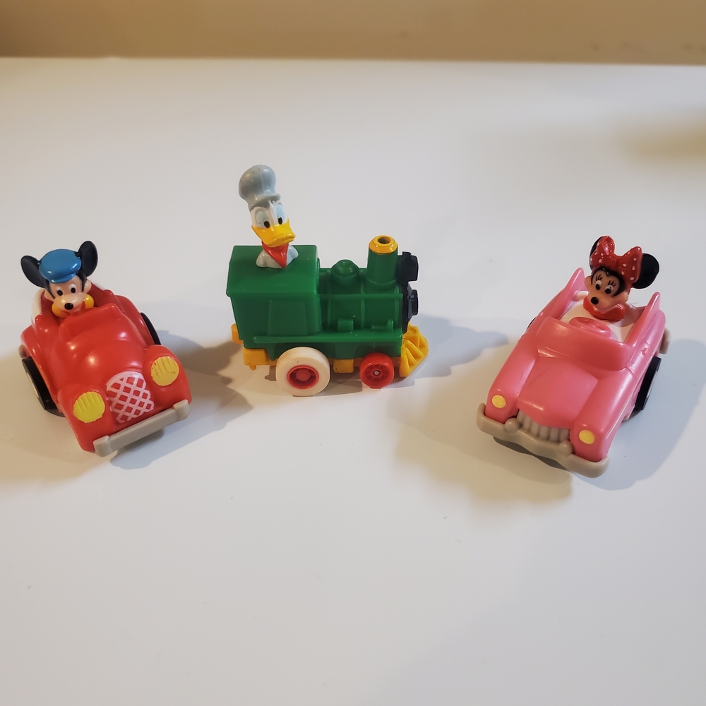 vintage 1988 McDonald's Happy Meal toys from the "Mickey's Birthdayland" set.